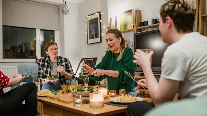 Students eat dinner together