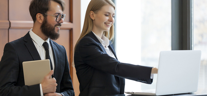 Staff at hotel reception desk